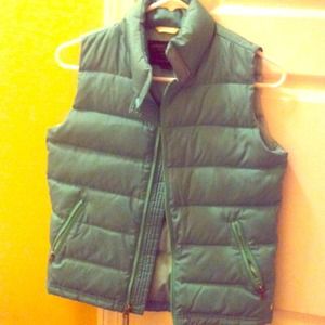 Green puffer vest.