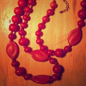 Tomato beaded necklace.