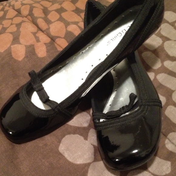 BCBG black leather slip ons