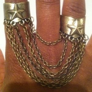 SOLD................Two finger rock star swag ring