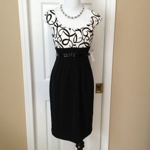 Flattering black and white dress. Perfect for work