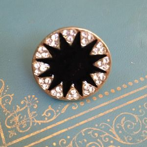 Black sunburst ring