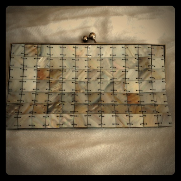 Clutch - mother of Pearl with  silk lining.