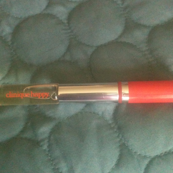 Sold in bundle.Clinique happy perfume and lipgloss