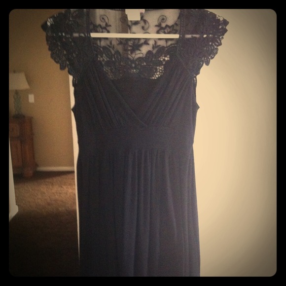 Black Dress with Lace sleeve and tie in back.