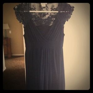 Black Dress with Lace sleeve and tie in back.