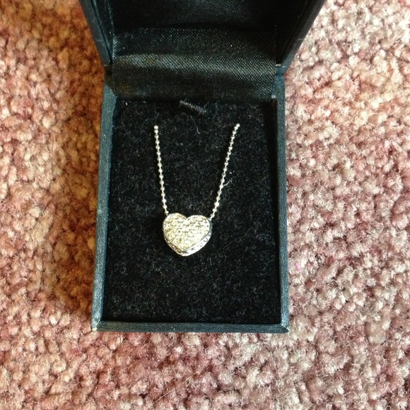 Silver heart necklace.