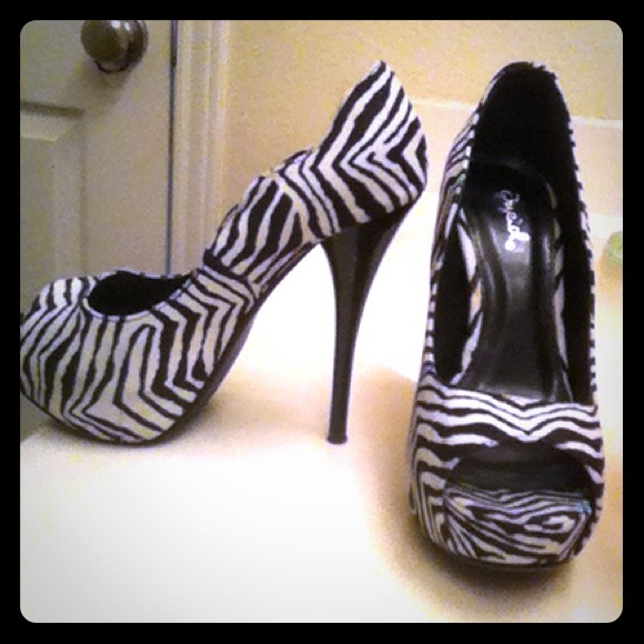 Zebra peep toe pumps