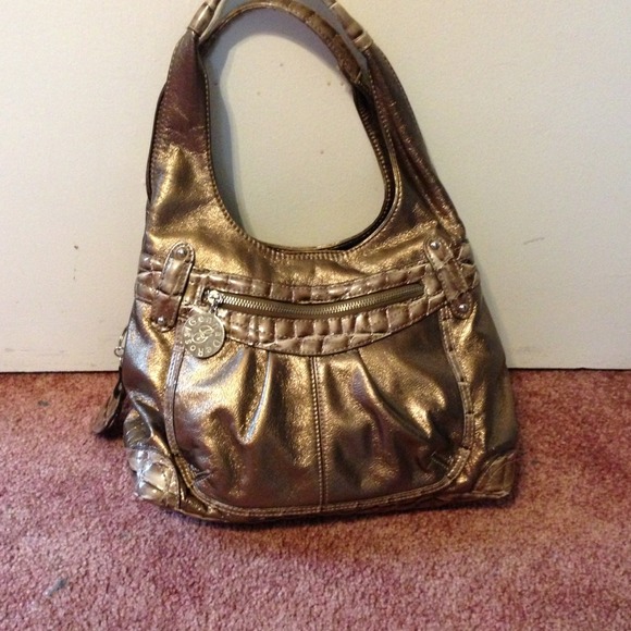 Champagne colored purse.