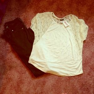 Cream colored mesh back top.