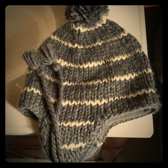 Gray and White trapper hat.