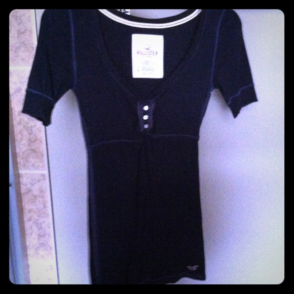 Dark navy blue shirt.