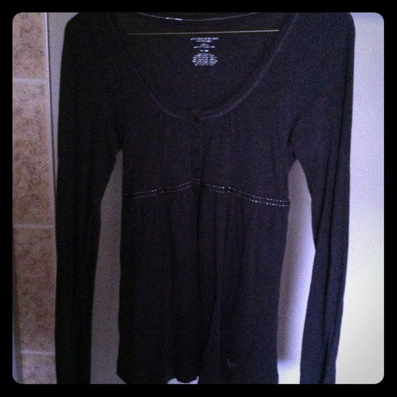 Dark charcoal long sleeve baby doll like top.