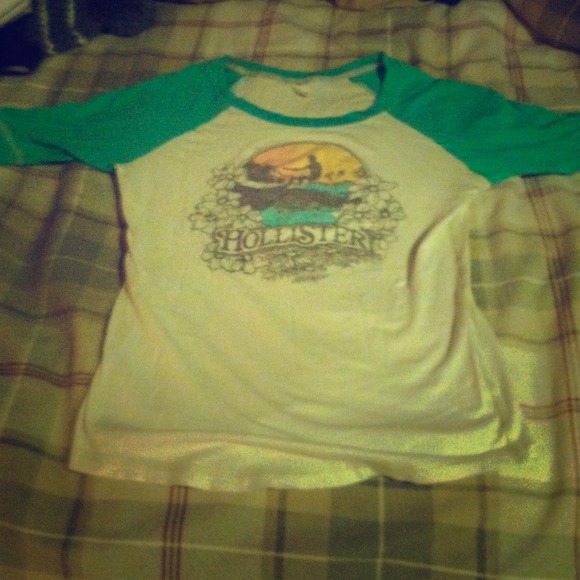 Teal and white baseball tee.