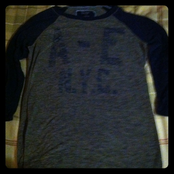 Navy and gray sheer baseball tee.