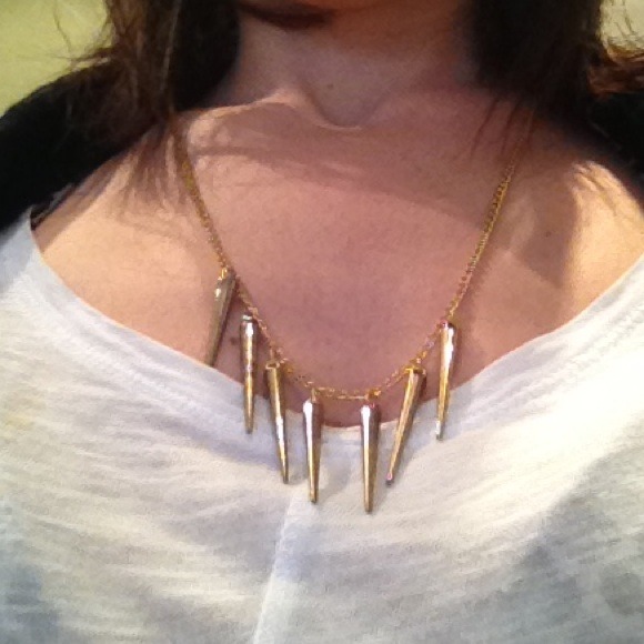 Spike necklace on gold colored chain