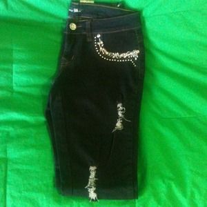 Dark blue denim jeans with adorable design.