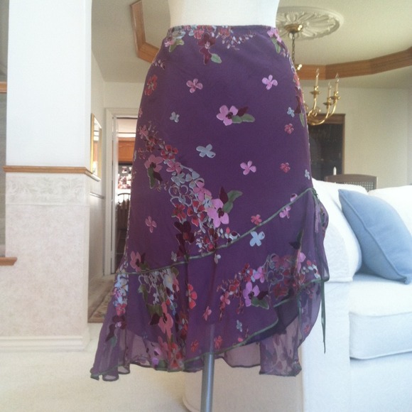 Purple silk flower skirt.