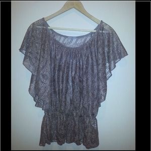 Brown laced see through shirt.