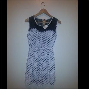 NEVER WORN. White and black polls dot dress.