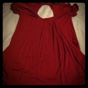 Long open back pink shirt