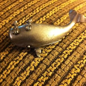 Tiny whale earrings with a holder