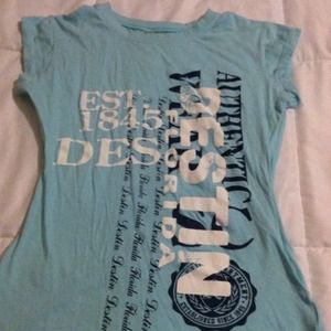 Printed light blue T-shirt.