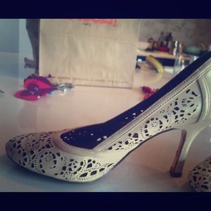 Alfani laser cut leather wedding heels.