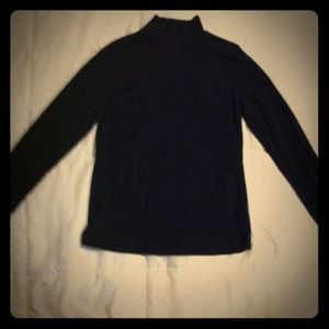 Plain black high collar long sleeved shirt.