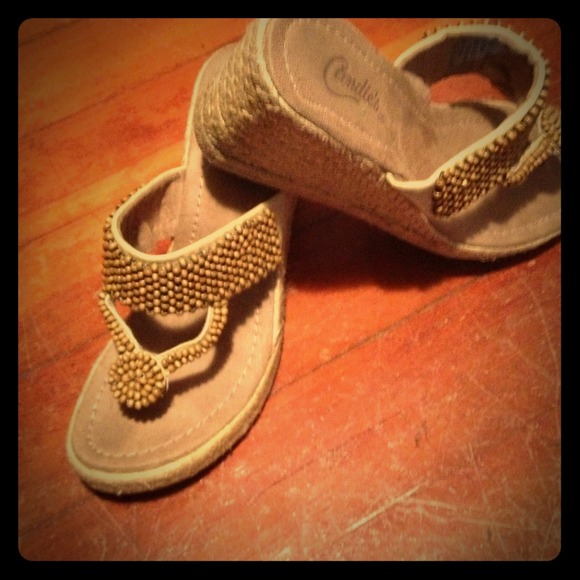 Beaded wedge sandals.