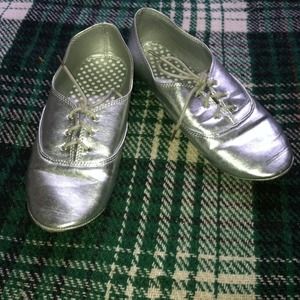 Silver oxfords.
