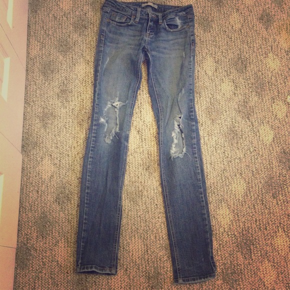 Distressed medium wash jeans
