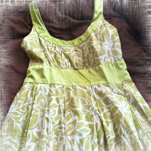 Green and white floral print baby doll dress