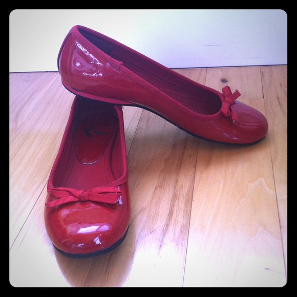Red patent flats with ribbon trim