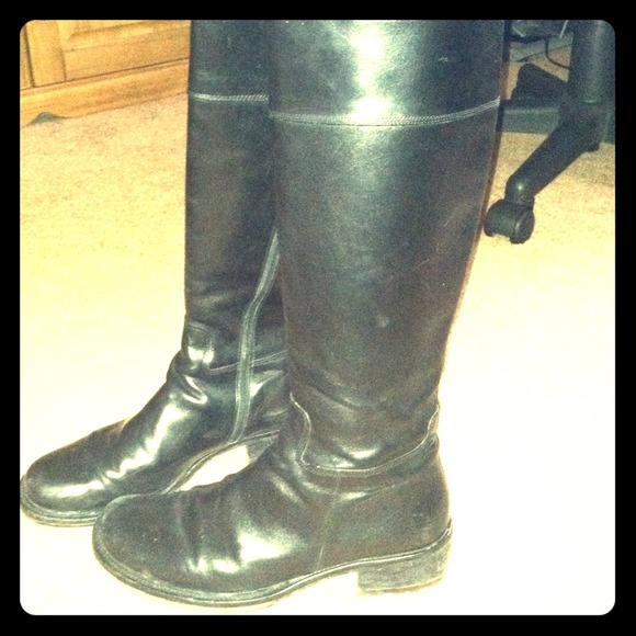 Below the knee black leather riding boots