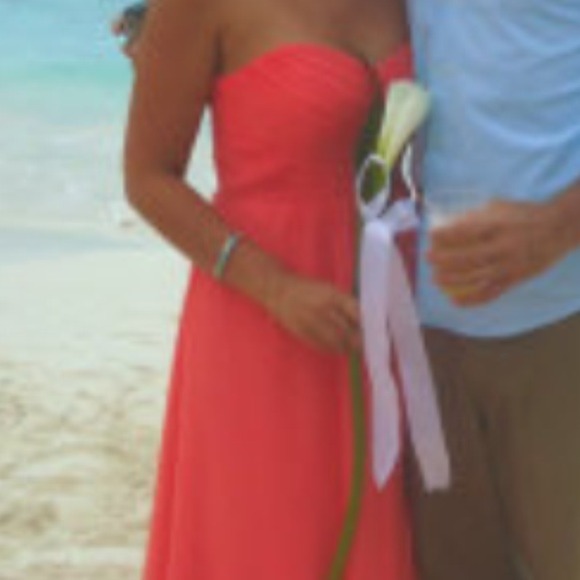 Coral floor length chiffon dress.