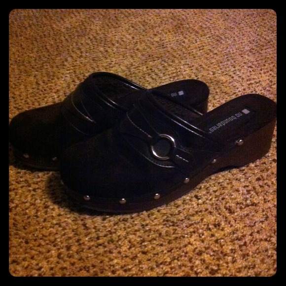 Brown studded clogs
