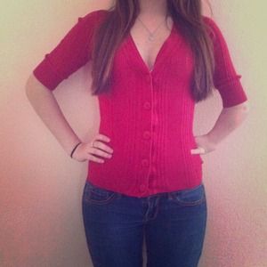 Red cardigan-like top. 3/4 Sleeve.