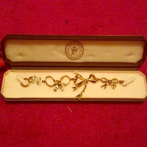 Juicy Couture bow bracelet.