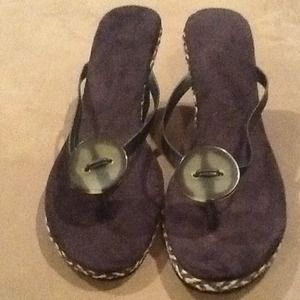 Brown and black sandals