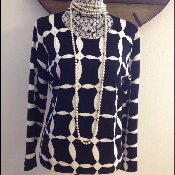 Beautiful off white &  black sweater.