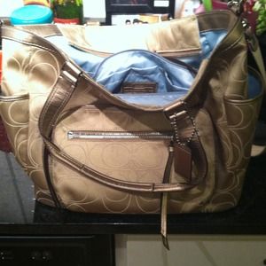 Coach gold and blue oversize bag.