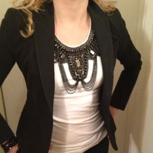 Top with intricate bib collar