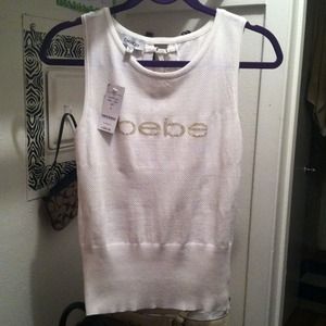 Brand new BEBE lace up back sweater