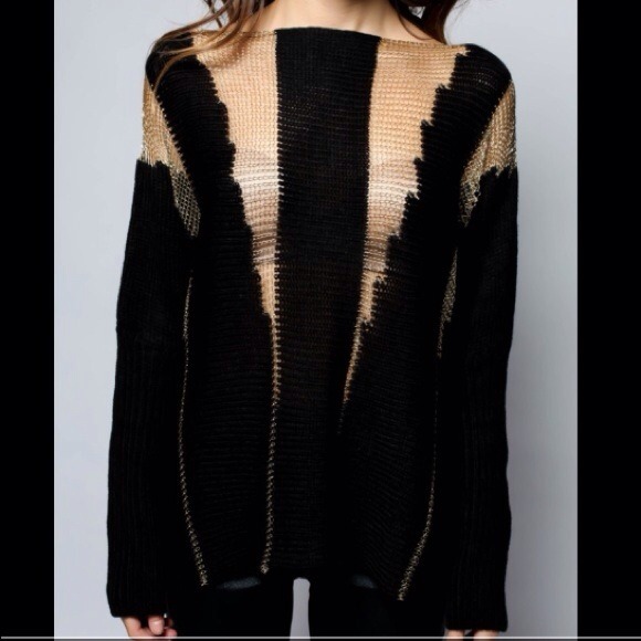 Black and gold sweater.