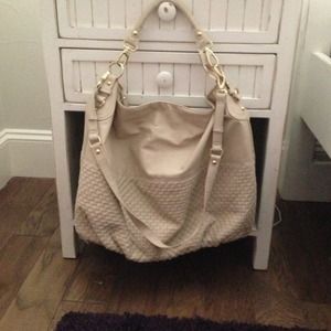 Steve Madden cream colored purse.