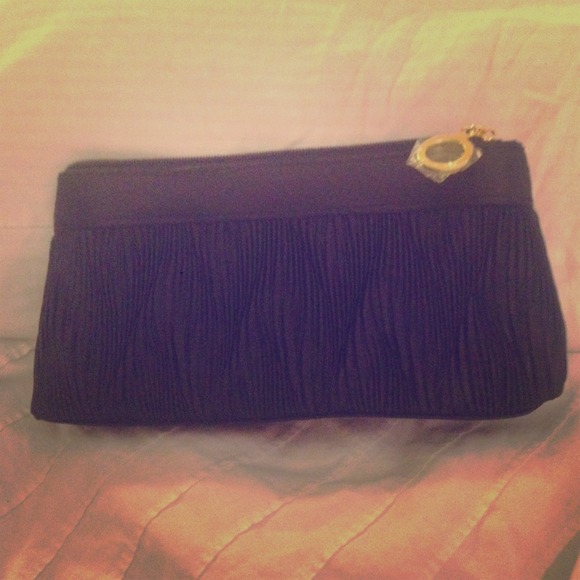 **Sold**Estee Lauder black cosmetics bag