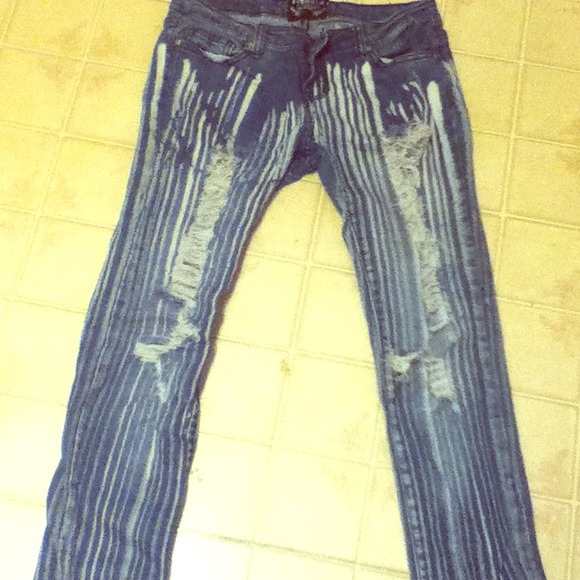 Striped, distressed skinny jeans