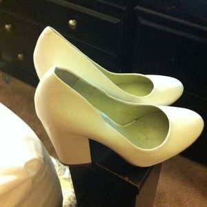 White patent leather heels.