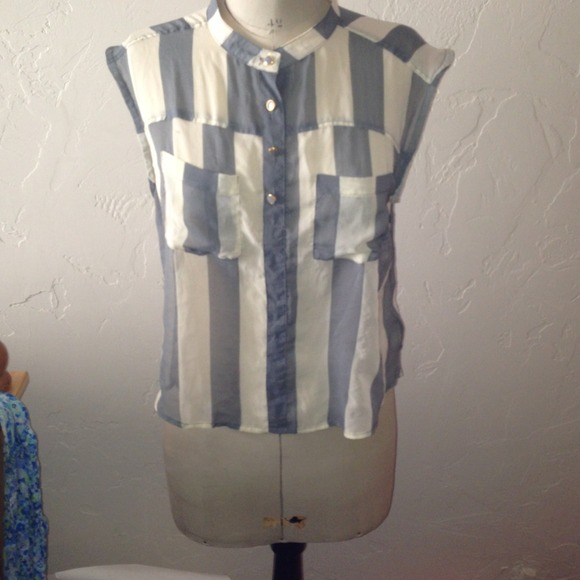 Sleeveless grey and white striped blouse